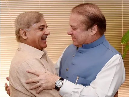 Sharif brother are hugging and smiling at each other